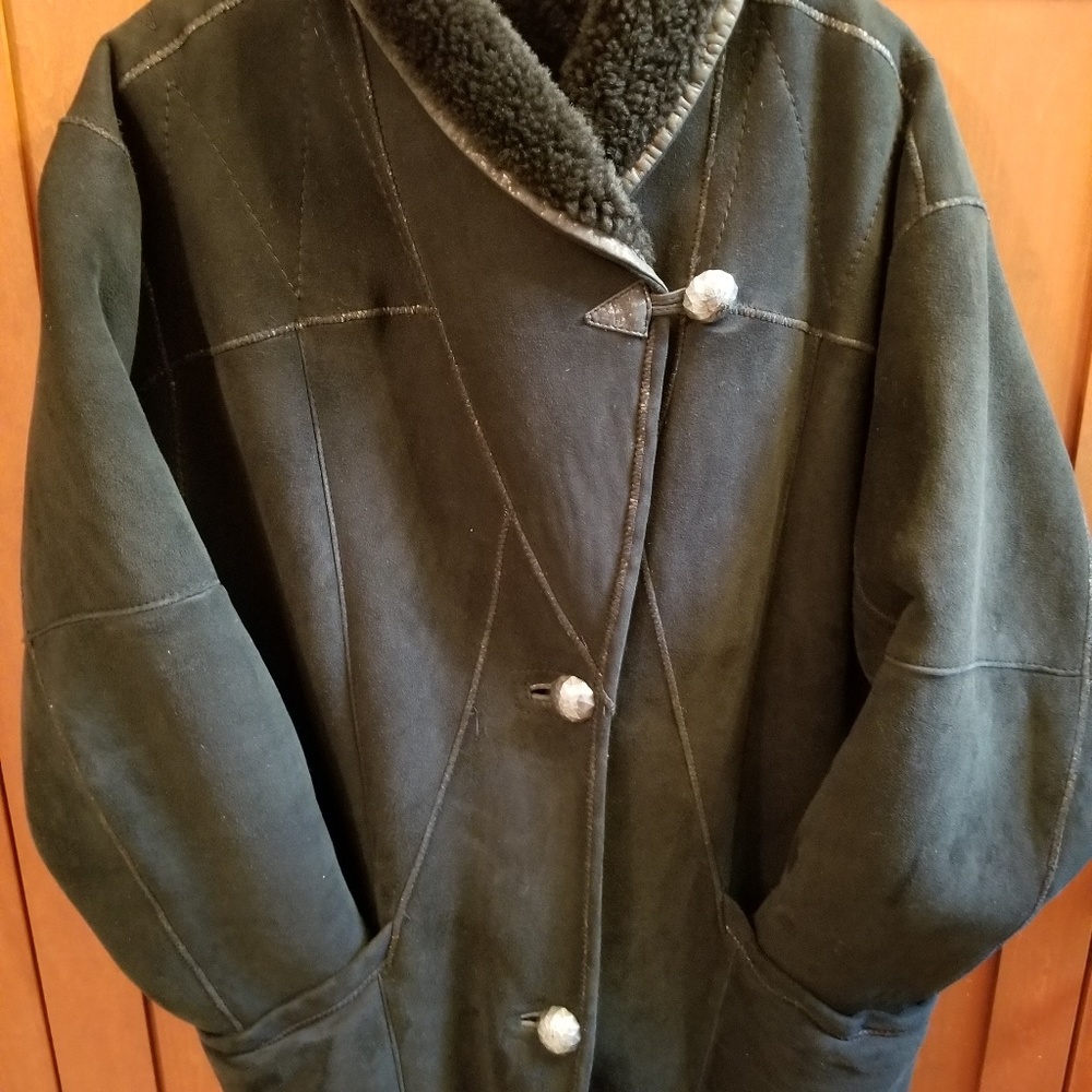Warm black genuine shearling knee length jacket